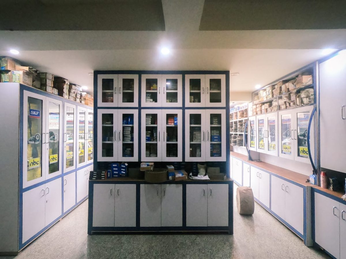 Wide view of Padam Chand Bearing showroom showing bearing cabinets and storage