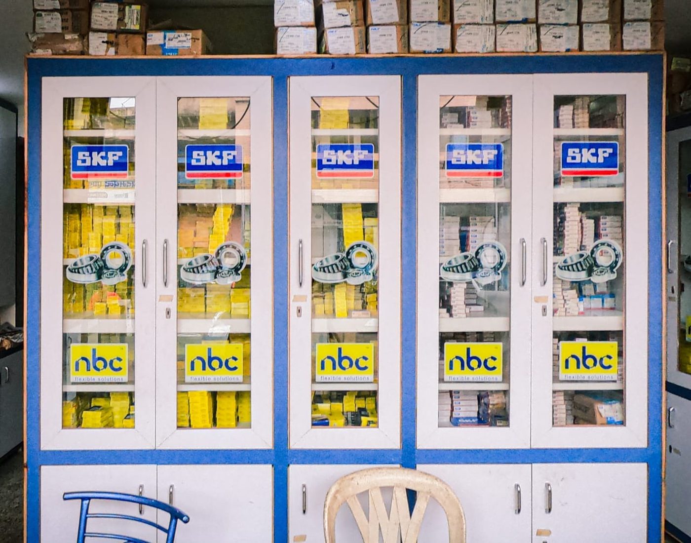 SKF and NBC bearing cabinet wall at Padam Chand Bearing Agra full of yellow bearing boxes