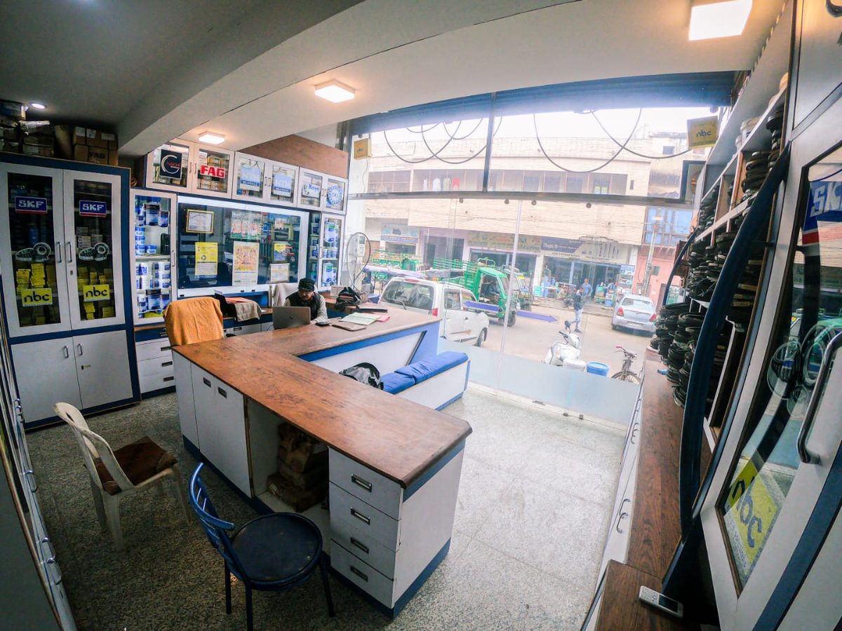 Inside Padam Chand Bearing showing counter and brand cabinet displays